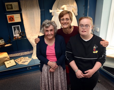 Peggy Brooks, former pupil at the School of Stitchery and Lace, Eloise Appleby, Chief Exec of The Grange Charity and Abbi Williams, current resident at The Grange charity