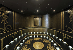 Hammam decorated with an intricate mosaic design, requiring specialist craftsmanship from Elite Stone.  